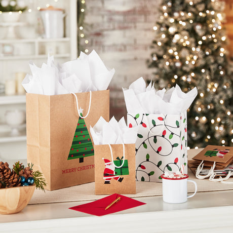 Sustainable Christmas Gift Bags for Kids (8 Bags: 3 Small 6", 3 Medium 9", 2 Large 13") Recyclable Kraft with Santa, Lights and Tree