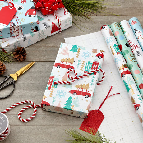 Holiday Wrapping Paper Bundle with Cut Lines on Reverse, Quirky Christmas (Pack of 4, 120 sq. ft. ttl) Yeti, Santa, Penguin, Snowflakes, Blue, Gold